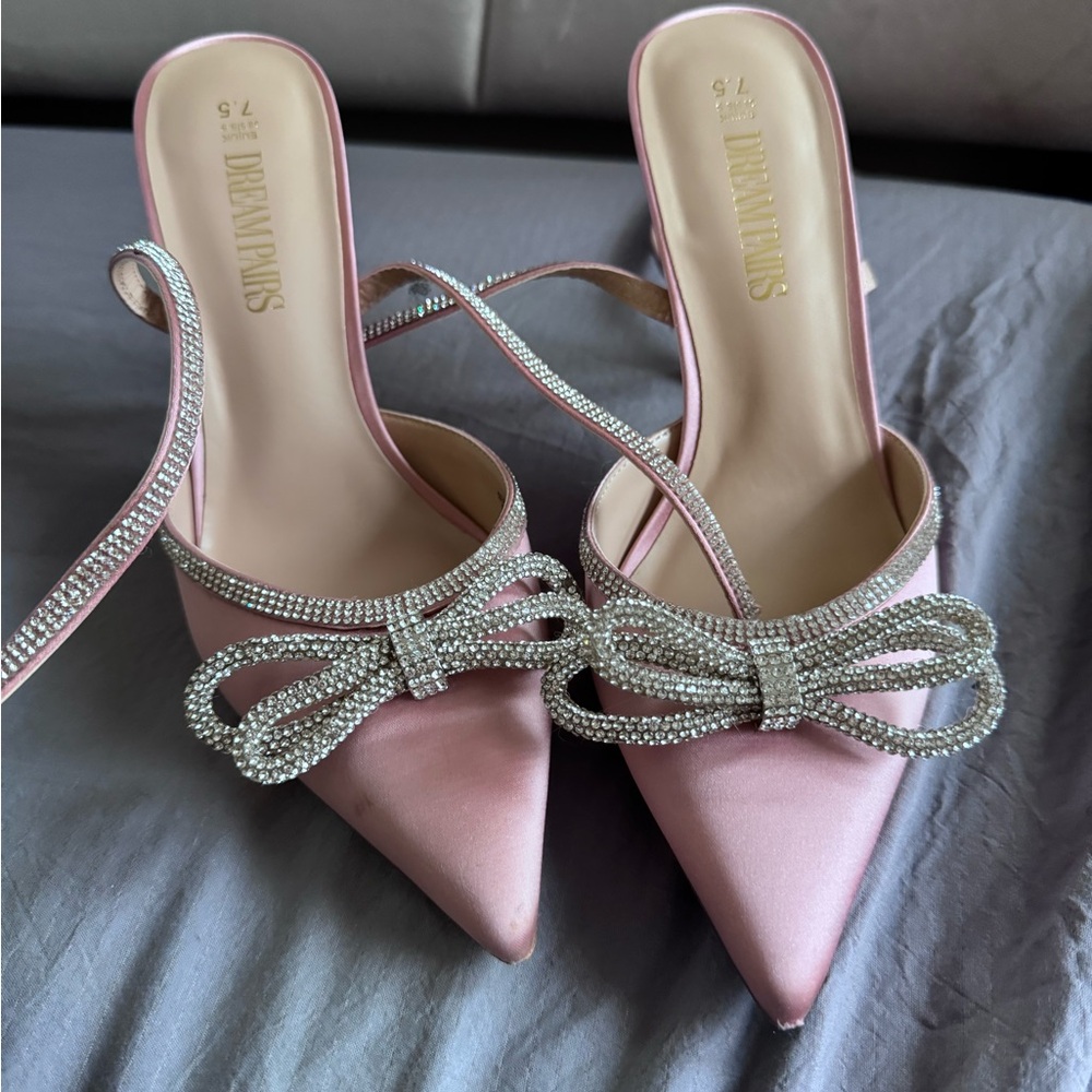 Pink bow heels lightly worn